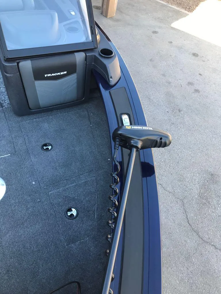 Slide: The Image of 2025 Tracker Targa V-19 Combo boat deck with trolling motor. - 24