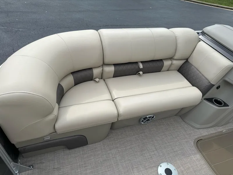 Slide: The Image of 2025 Sun Tracker Party Barge 22 RF XP3 beige seating with cup holder and speaker. - 10