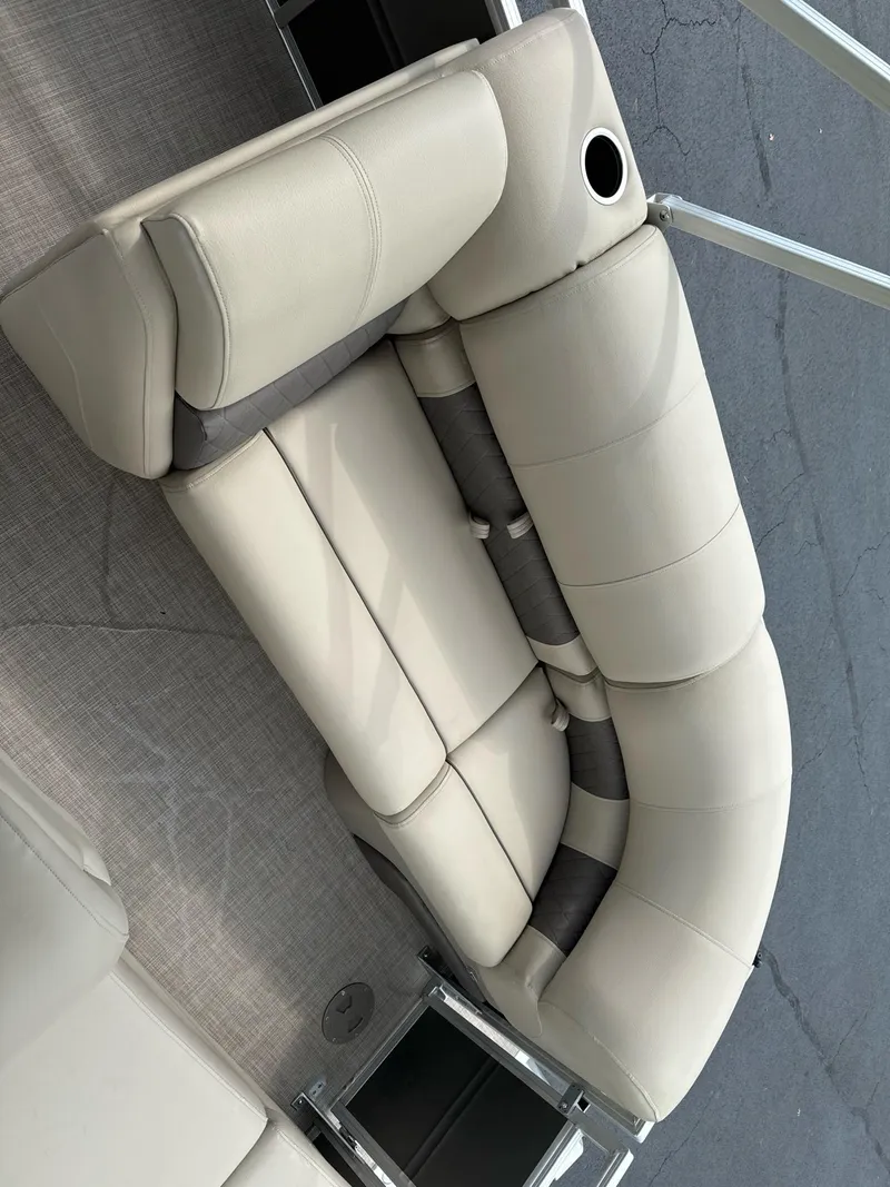Slide: The Image of 2025 Sun Tracker Party Barge 22 RF XP3 beige seating with cup holder. - 18