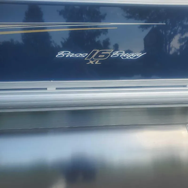 Slide: The Image of 2025 Sun Tracker Bass Buggy 16 XL Select logo on blue background. - 4