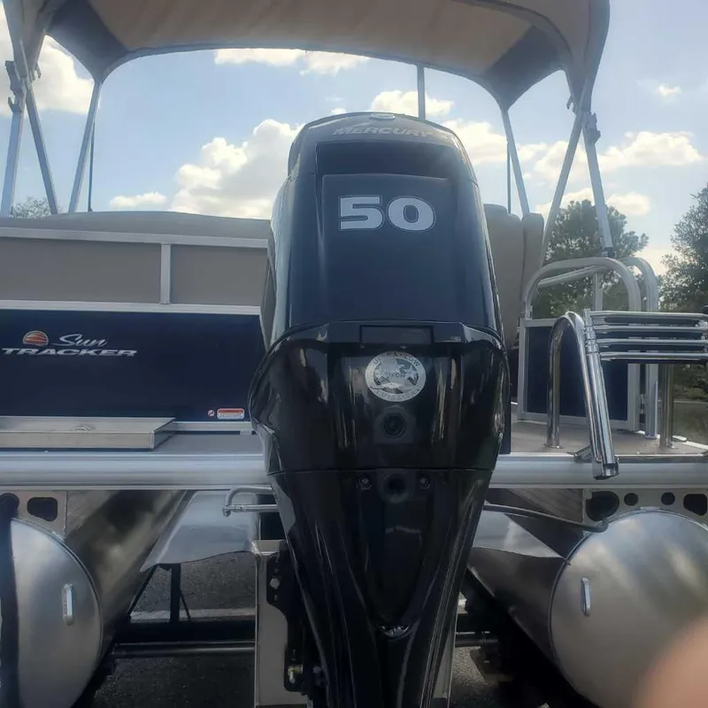Slide: The Image of 2025 Sun Tracker Bass Buggy 16 XL Select with 50 HP Mercury outboard motor. - 5