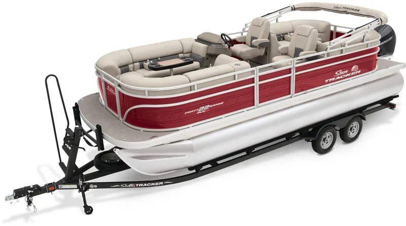 The Image of 2025 Sun Tracker Party Barge 22 RF XP3 pontoon boat on trailer in parking lot. - 0