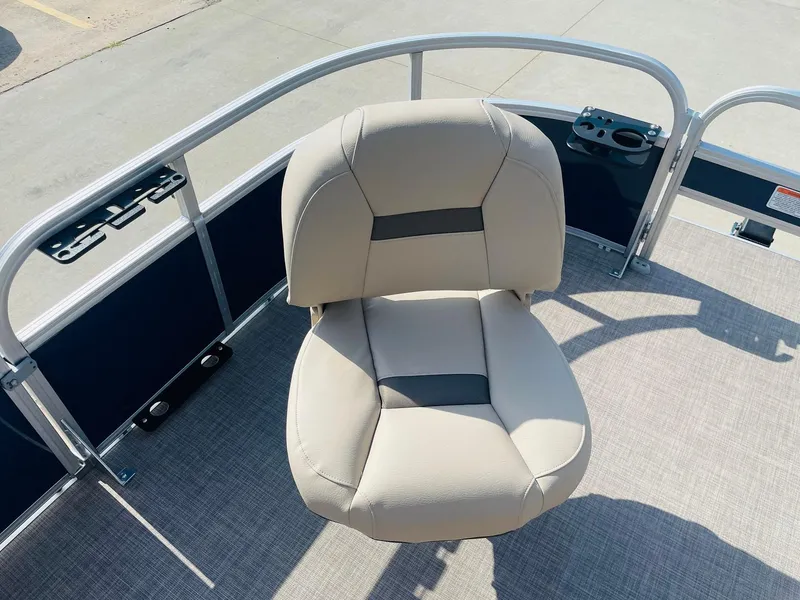Slide: The Image of 2025 Sun Tracker Bass Buggy 16 XL Select boat seat, beige upholstery, cup holder, and railing. - 11