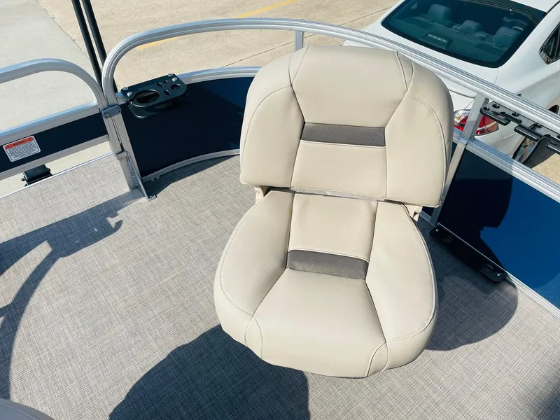 Slide: The Image of Beige captain's chair on 2025 Sun Tracker Bass Buggy 16 XL Select pontoon boat. - 13