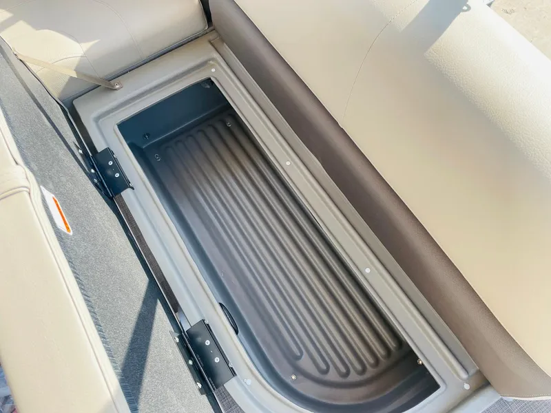Slide: The Image of Storage compartment in 2025 Sun Tracker Bass Buggy 16 XL Select boat. - 17