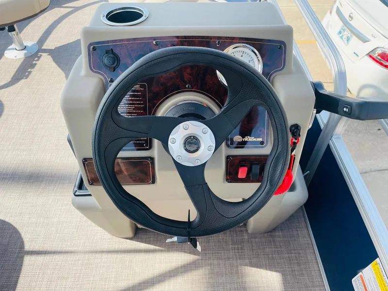 Slide: The Image of Steering wheel of 2025 Sun Tracker Bass Buggy 16 XL Select pontoon boat. - 21