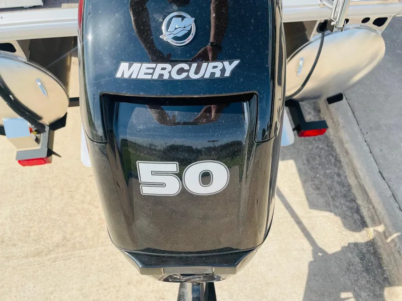 Slide: The Image of Mercury 50 horsepower outboard motor on 2025 Sun Tracker Bass Buggy 16 XL Select. - 25