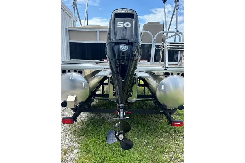 Slide: The Image of 2025 Sun Tracker Party Barge 16 DLX with Mercury 50 outboard motor, rear view. - 4