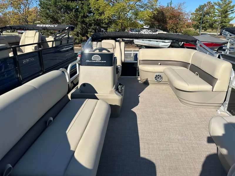 Slide: The Image of 2025 Sun Tracker Party Barge 16 DLX pontoon boat with spacious seating and modern design. - 5