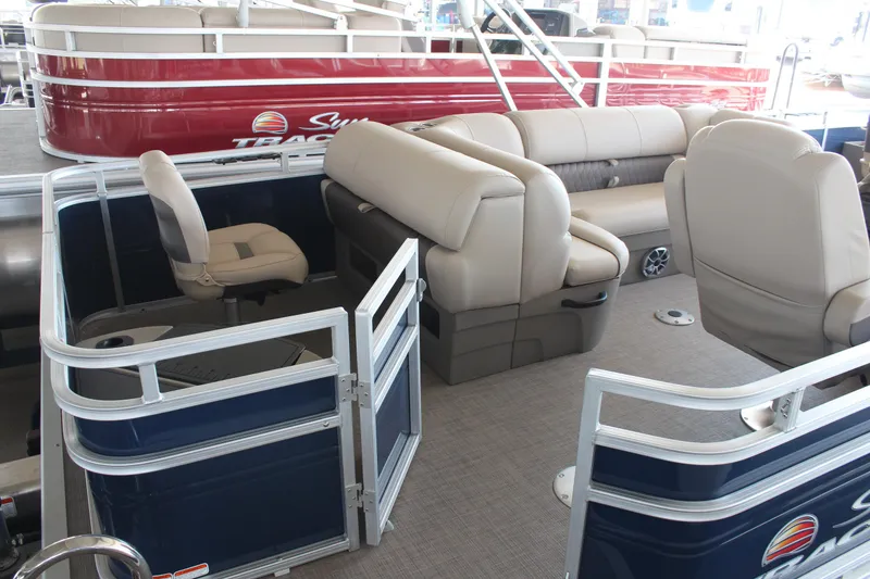 Slide: The Image of 2025 Sun Tracker Fishin' Barge 20 DLX interior with seating and fishing area. - 5