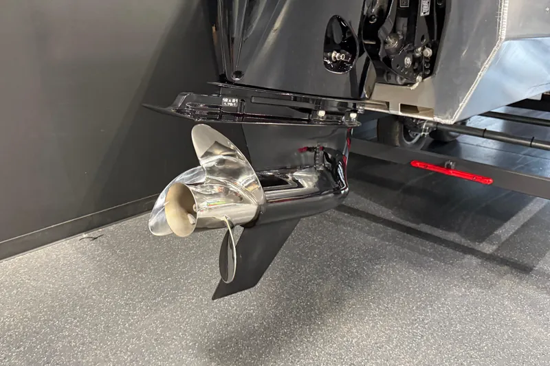 Slide: The Image of 2025 Sun Tracker Sportfish 24 XP3 boat propeller and motor detail. - 24