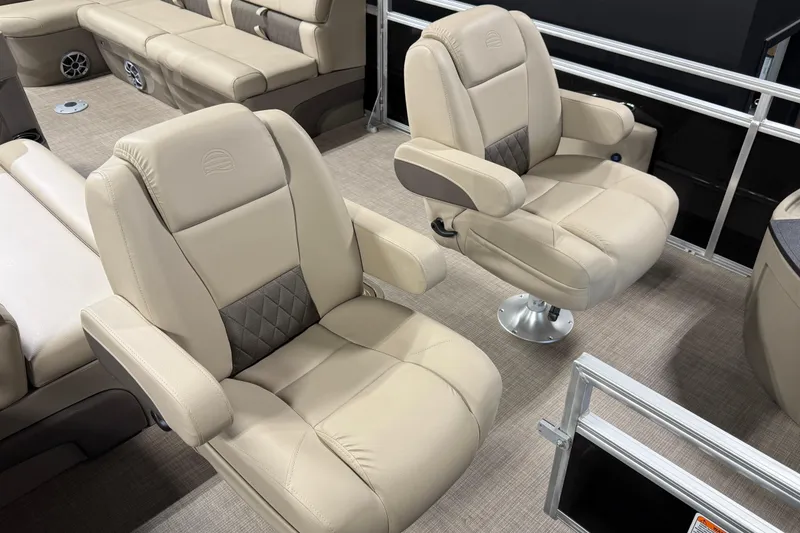 Slide: The Image of Luxurious seating on 2025 Sun Tracker Sportfish 24 XP3 pontoon boat interior. - 7