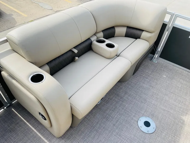 Slide: The Image of 2025 Sun Tracker Party Barge 22 RF DLX seating with cup holders on deck. - 11