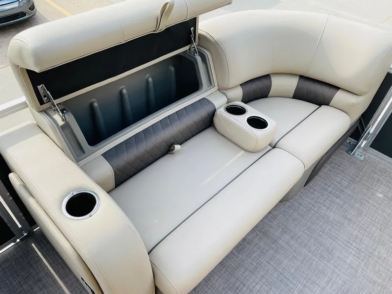 Slide: The Image of 2025 Sun Tracker Party Barge 22 RF DLX seating with storage and cup holders. - 12