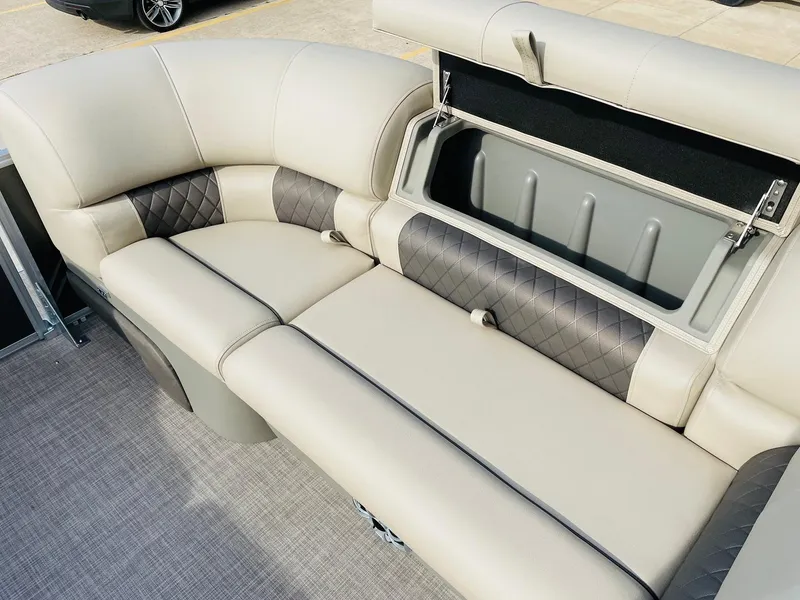 Slide: The Image of 2025 Sun Tracker Party Barge 22 RF DLX seating with storage compartment. - 16