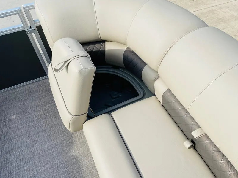 Slide: The Image of 2025 Sun Tracker Party Barge 22 RF DLX seating with storage compartment. - 18