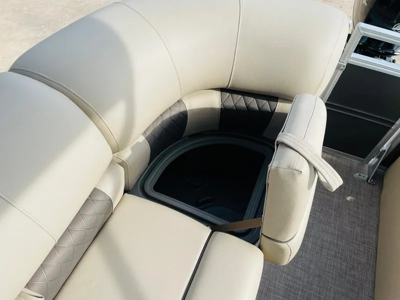 Slide: The Image of 2025 Sun Tracker Party Barge 22 RF DLX seating with storage compartment. - 33
