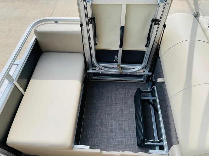 Slide: The Image of 2025 Sun Tracker Party Barge 22 RF DLX interior seating and storage area. - 36