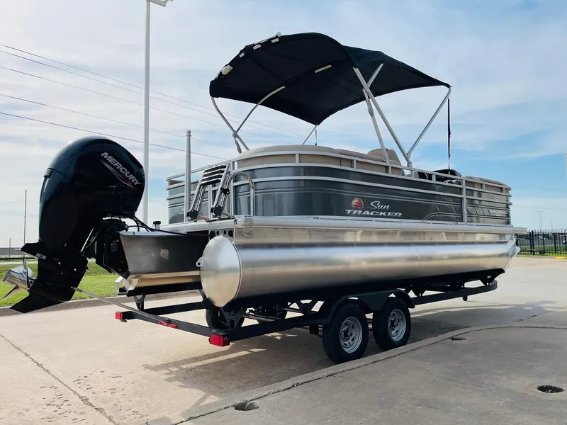 Slide: The Image of 2025 Sun Tracker Party Barge 22 RF DLX pontoon boat on trailer. - 5