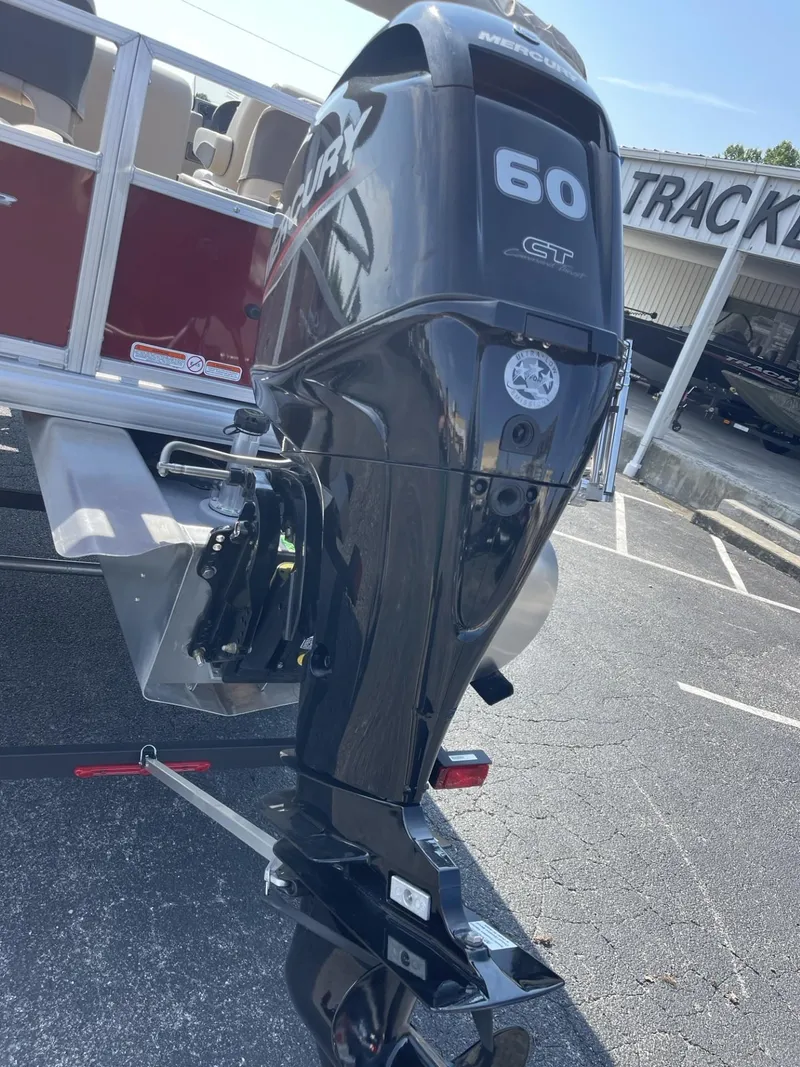 Slide: The Image of 2025 Sun Tracker Bass Buggy 18 DLX with 60 HP outboard motor. - 3