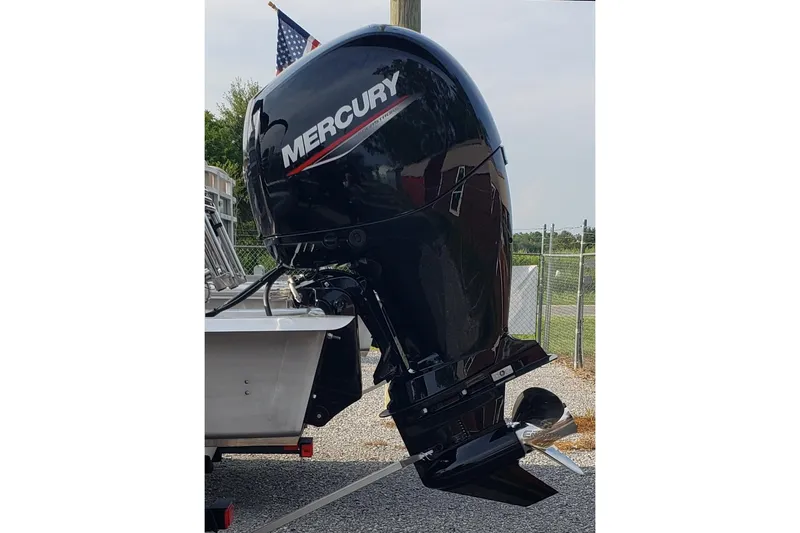 Slide: The Image of 2025 Sun Tracker Party Barge 22 DLX with Mercury outboard motor. - 2