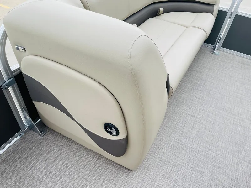 Slide: The Image of 2025 Sun Tracker Party Barge 18 DLX interior seating with beige upholstery. - 16