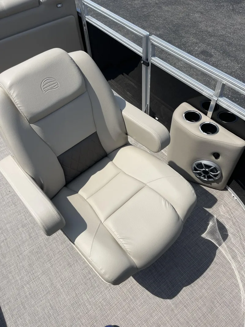Slide: The Image of 2025 Sun Tracker SportFish 20 DLX boat seat with cup holders and speaker. - 5