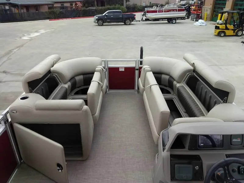Slide: The Image of 2025 Sun Tracker Party Barge 20 DLX interior with spacious seating and modern design. - 5