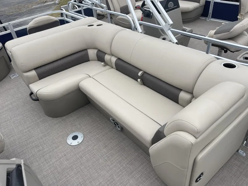 Slide: The Image of 2025 Sun Tracker Fishin' Barge 20 DLX, beige seating, spacious and comfortable layout. - 8