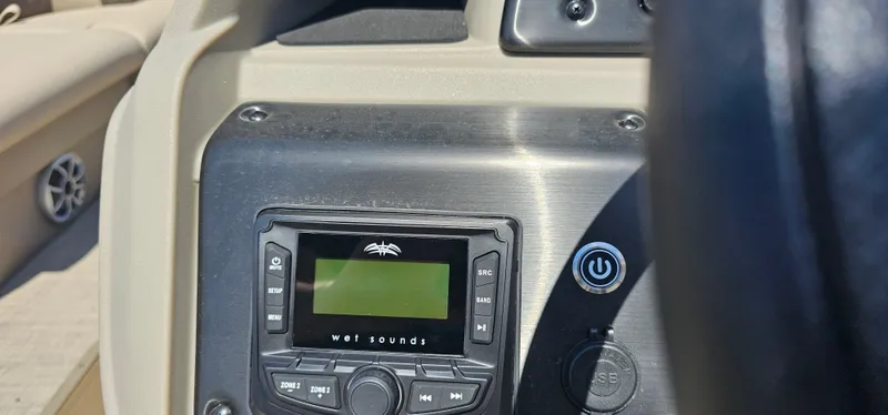 Slide: The Image of Control panel of 2025 Sun Tracker Party Barge 22 RF XP3 with Wet Sounds audio system. - 11