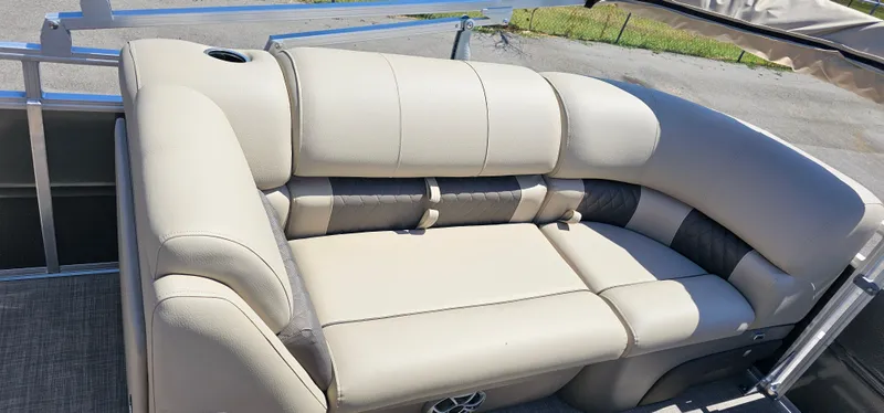 Slide: The Image of 2025 Sun Tracker Party Barge 22 RF XP3, beige seating, outdoor setting. - 5