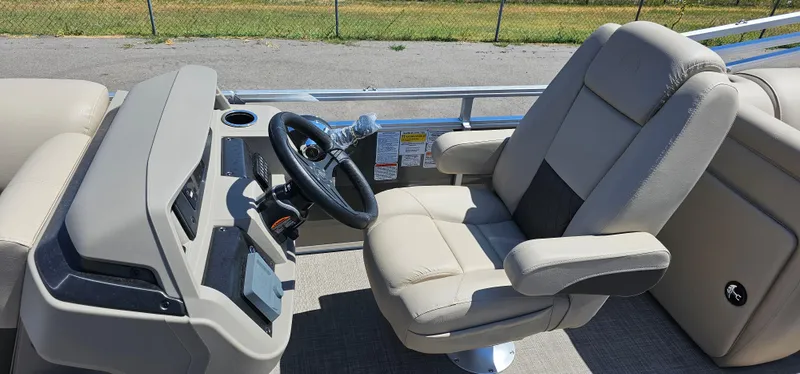 Slide: The Image of 2025 Sun Tracker Party Barge 22 RF XP3 helm with comfortable captain's chair. - 9