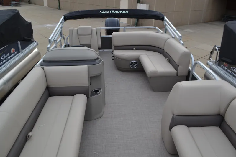 Slide: The Image of 2025 Sun Tracker Party Barge 16 DLX with spacious seating and modern design. - 4