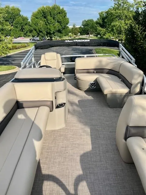 Slide: The Image of 2025 Sun Tracker Party Barge 18 DLX with spacious seating and modern design. - 4