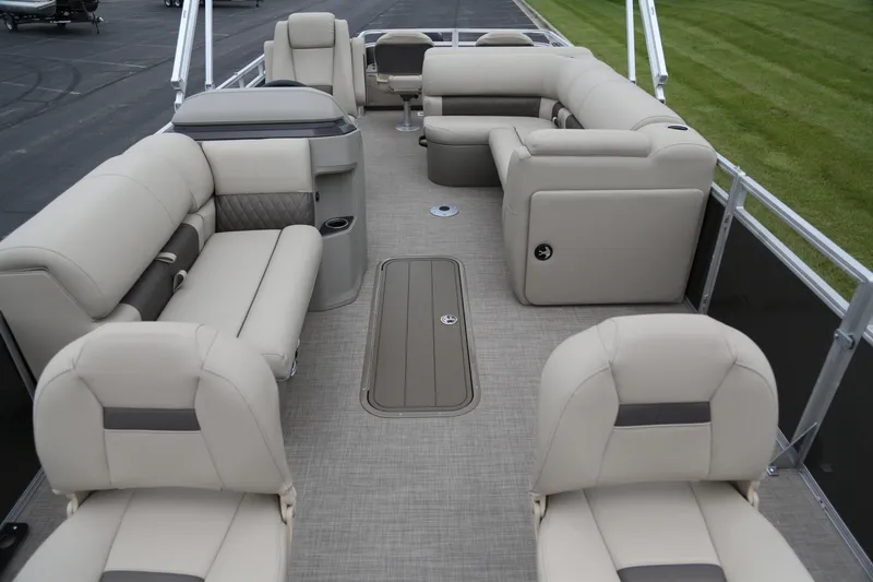 Slide: The Image of 2025 Sun Tracker Fishin' Barge 22 XP3 interior with spacious seating and modern design. - 2