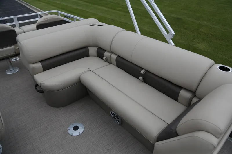 Slide: The Image of 2025 Sun Tracker Fishin' Barge 22 XP3 interior seating with beige upholstery. - 5
