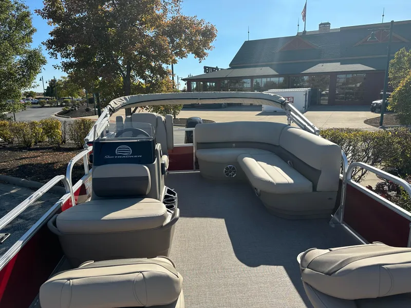 Slide: The Image of 2025 Sun Tracker Bass Buggy 16 XL Select pontoon boat with spacious seating. - 2
