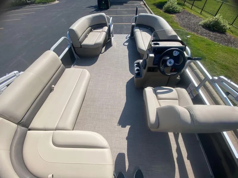 Slide: The Image of 2025 Sun Tracker Party Barge 16 DLX with spacious seating and modern helm. - 3