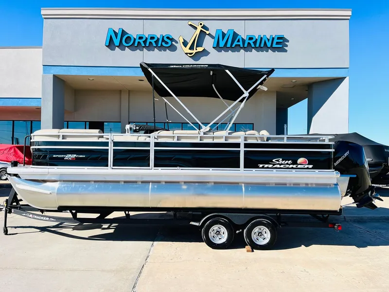 The Image of 2025 Sun Tracker SportFish 22 XP3 pontoon boat at Norris Marine dealership. - 1