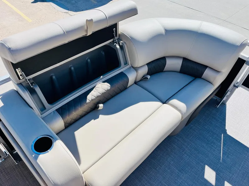 Slide: The Image of 2025 Sun Tracker SportFish 22 XP3 boat seat with storage compartment and cup holder. - 14