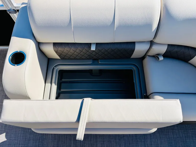 Slide: The Image of Sun Tracker SportFish 22 XP3 2025 boat seat with storage compartment and cup holder. - 17