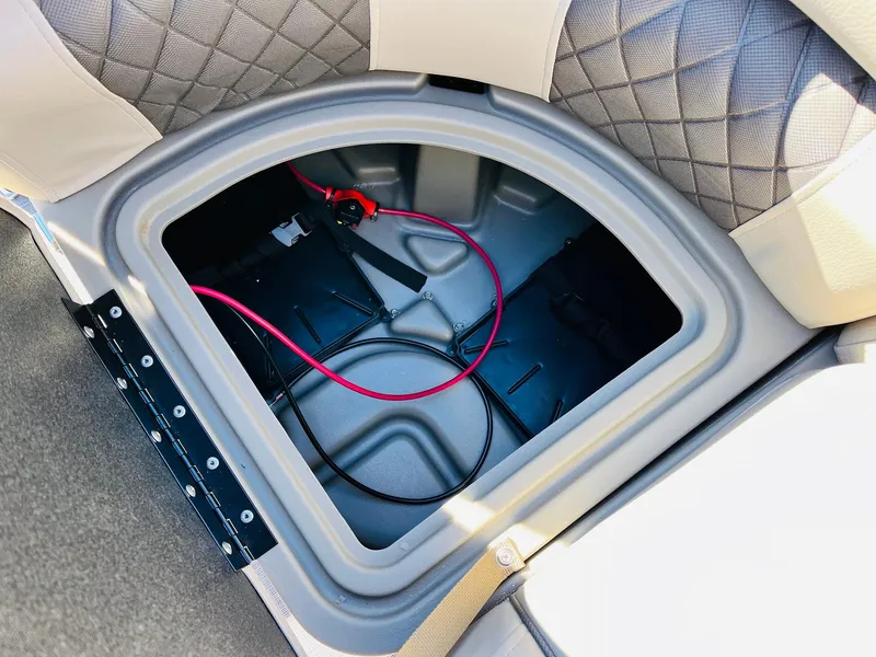 Slide: The Image of Storage compartment in 2025 Sun Tracker SportFish 22 XP3 boat with wiring visible. - 27