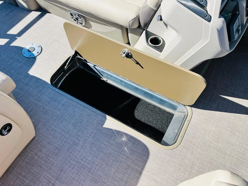 Slide: The Image of 2025 Sun Tracker SportFish 22 XP3 boat interior storage compartment. - 31
