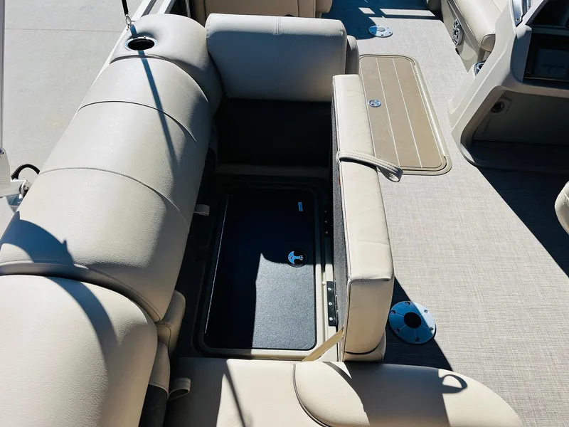 Slide: The Image of 2025 Sun Tracker SportFish 22 XP3 interior seating and storage compartment. - 39