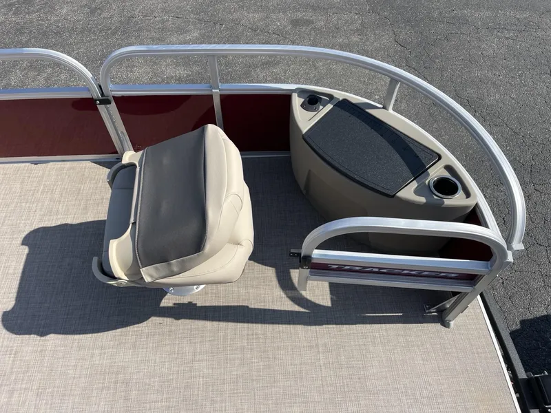 Slide: The Image of 2025 Sun Tracker Bass Buggy 18 DLX boat interior with seating and storage. - 7