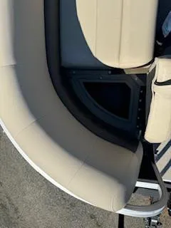 Slide: The Image of 2025 Sun Tracker Party Barge 18 DLX, beige seating detail, aerial view. - 12