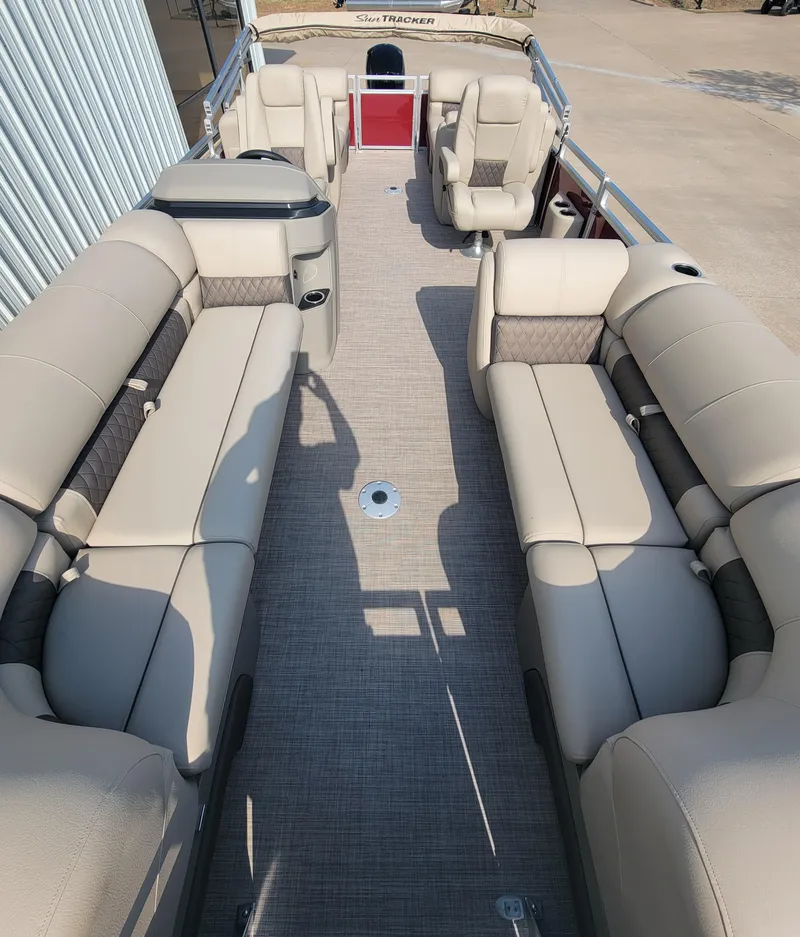 Slide: The Image of 2025 Sun Tracker Party Barge 22 DLX with spacious seating and modern design. - 2