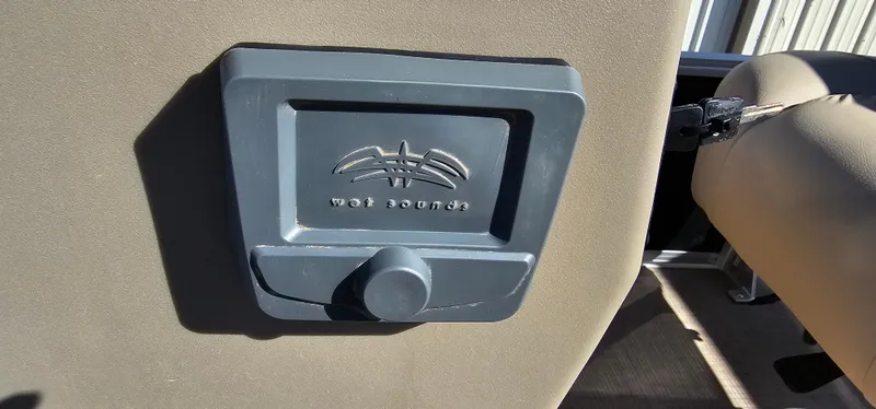 Slide: The Image of Wet Sounds speaker on 2025 Sun Tracker Party Barge 16 DLX boat interior. - 13