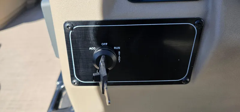 Slide: The Image of Ignition switch of 2025 Sun Tracker Party Barge 16 DLX pontoon boat. - 17