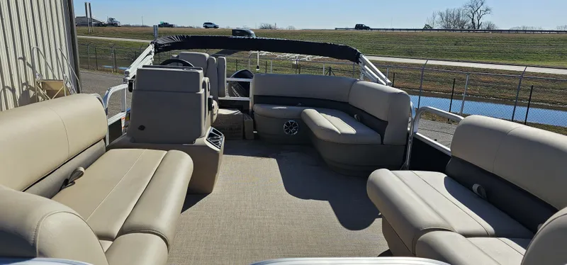 Slide: The Image of 2025 Sun Tracker Party Barge 16 DLX interior with spacious seating and modern design. - 4